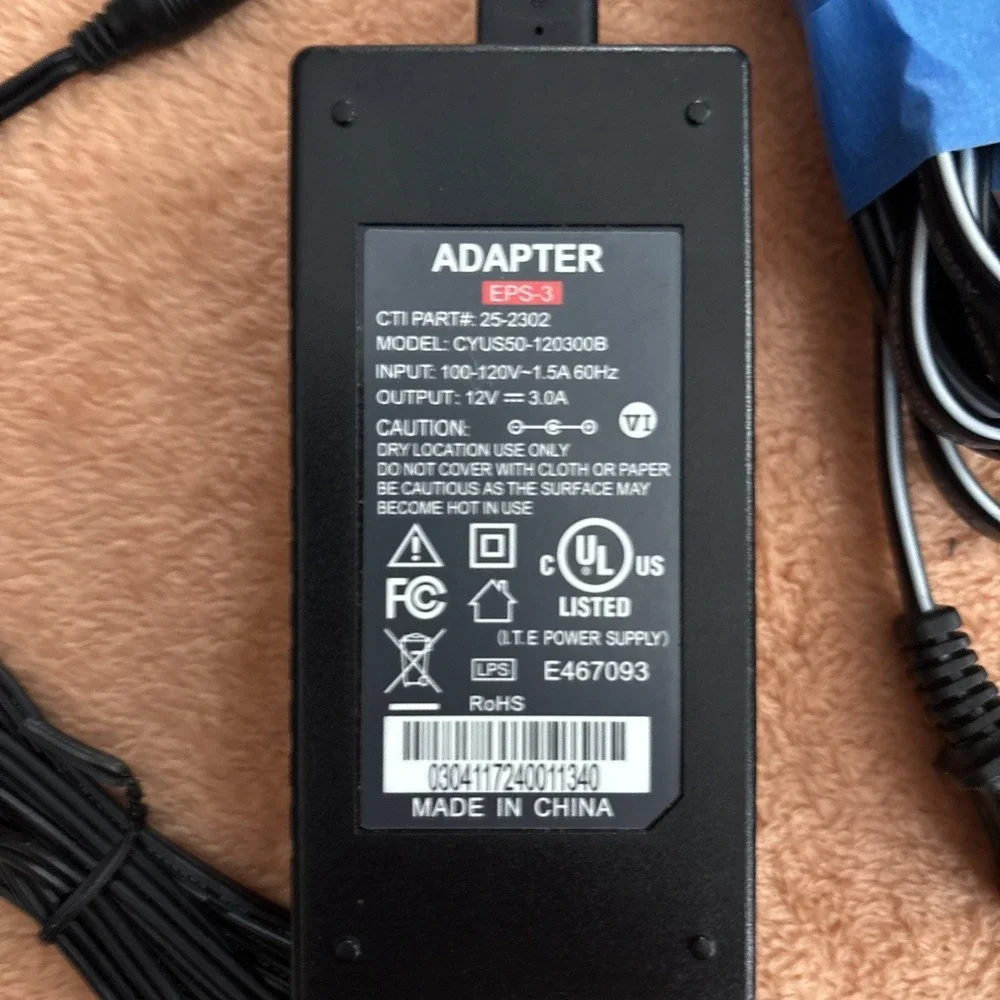 Adapter :model no: CTI#25-2302. input :120v AC. Out put 12V  DC 3.0A